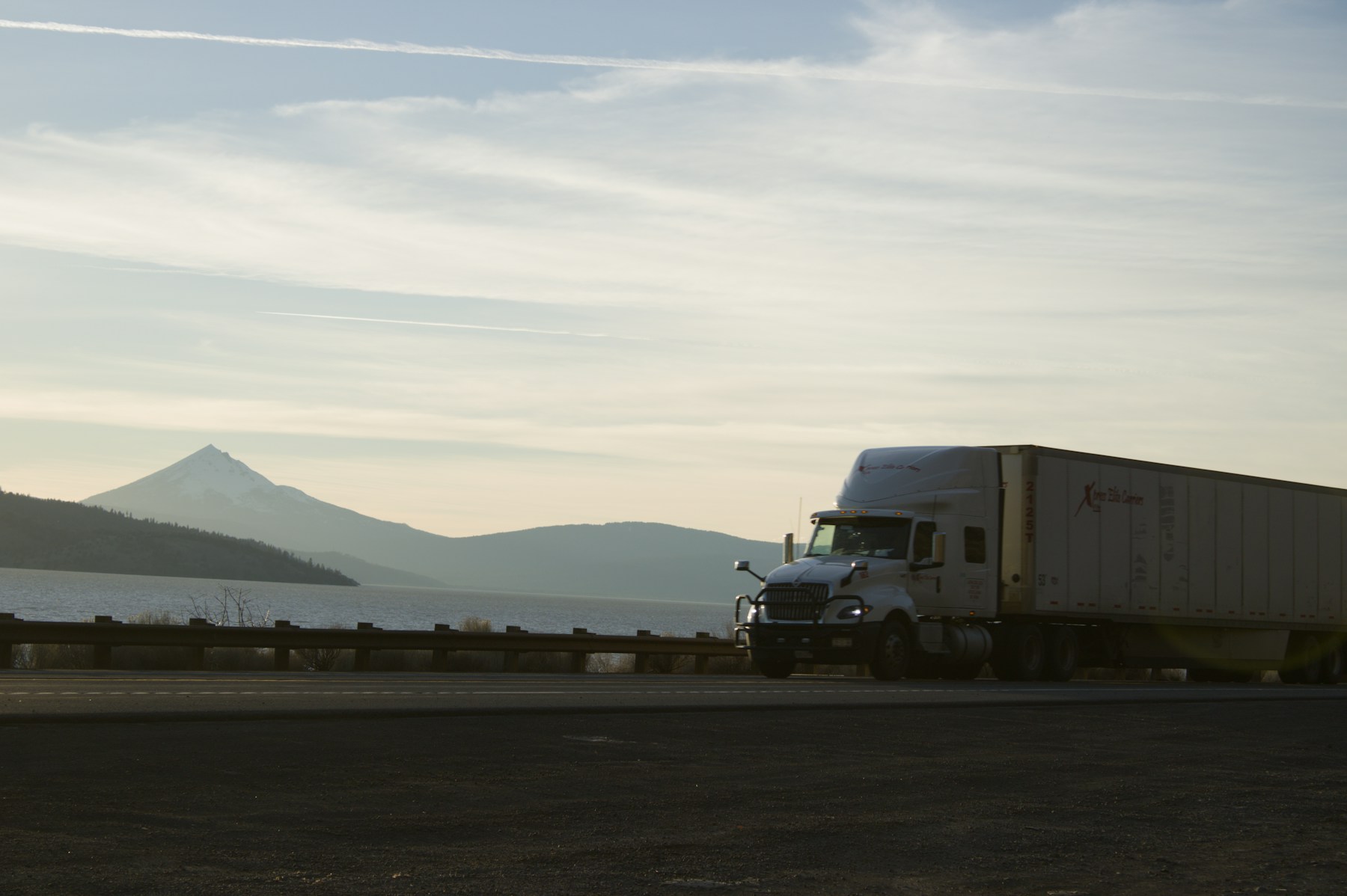 Freight truck traveling along a mountain highway