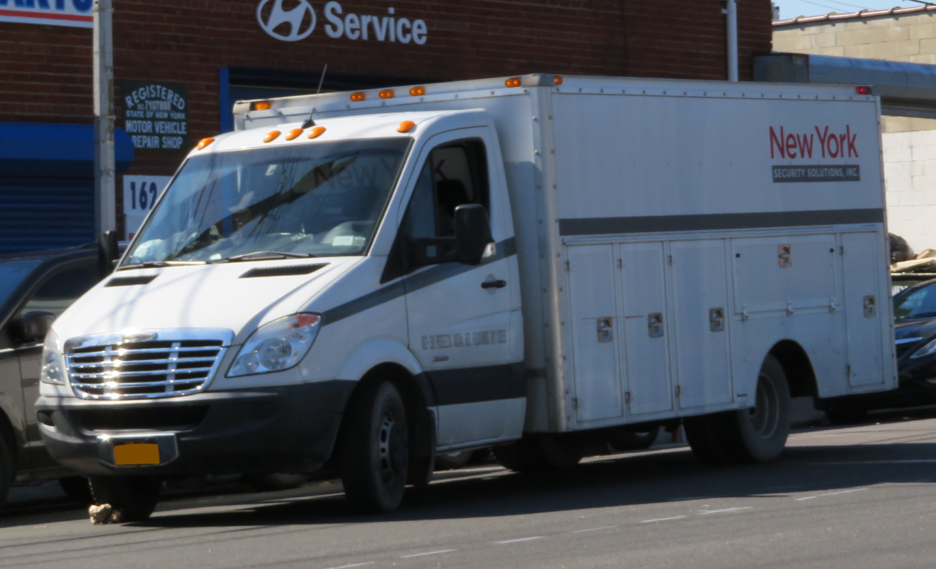 White Freightliner Sprinter box truck in New York.